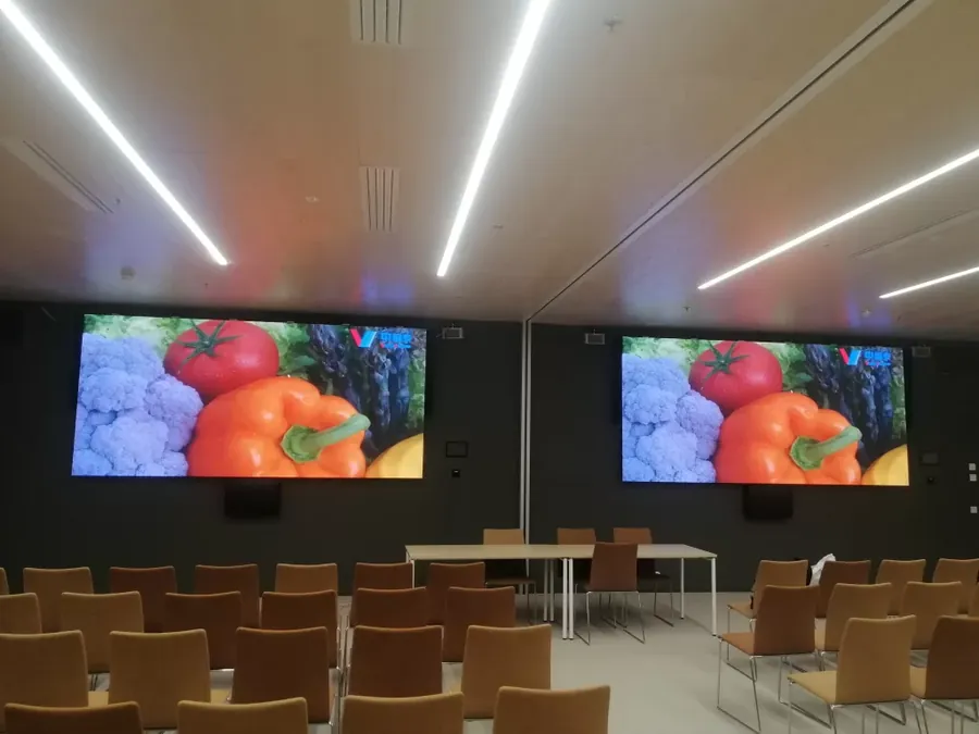 Large fine pitch LED screens in an auditorium
